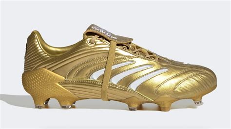 gold adidas predator football boots.